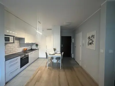 Kuchnia lub aneks kuchenny w obiekcie Cosy apartment near to the Chopin's airport Cybernetyki 2C