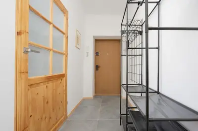 Łóżko lub łóżka piętrowe w pokoju w obiekcie Przytulny i Tradycyjny Apartament na Parterze w Centrum Warszawy by Noclegi Renters