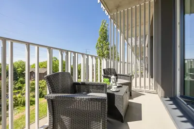Balkon lub taras w obiekcie Stacja Wola Nowoczesny Apartament z Balkonem i Parkingiem Warszawa by Noclegi Renters