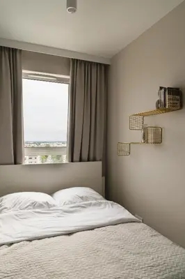 Łóżko lub łóżka w pokoju w obiekcie Apartament Pełczyńskiego 3