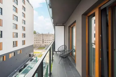 Balkon lub taras w obiekcie Wola Pawia Comfort Studio by BookingHost