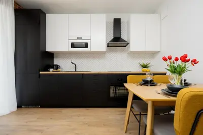 Kuchnia lub aneks kuchenny w obiekcie Komfortowy Apartament dla 4 osób z Parkingiem by Noclegi Renters