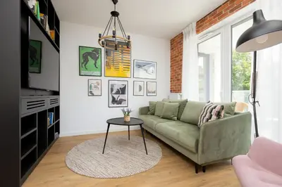 Część wypoczynkowa w obiekcie Komfortowy Apartament dla 4 osób z Parkingiem by Noclegi Renters