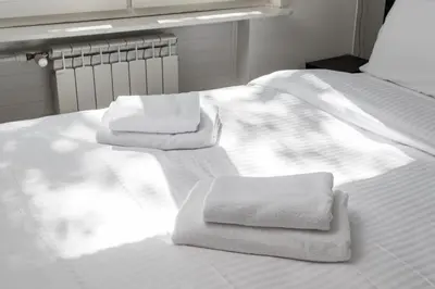 Łóżko lub łóżka w pokoju w obiekcie Nowa Praga Comfort Apartment by BookingHost