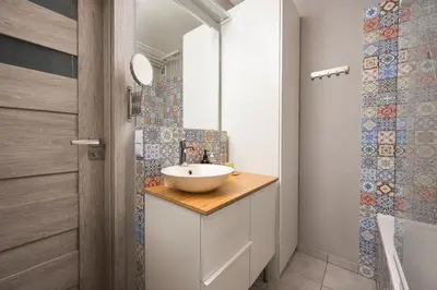 Łazienka w obiekcie Nowa Praga Comfort Apartment by BookingHost