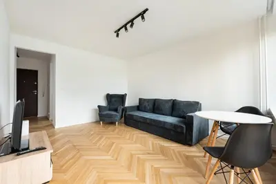 Telewizja i/lub zestaw kina domowego w obiekcie Nowa Praga Standard Apartment by BookingHost
