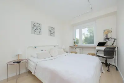 Łóżko lub łóżka w pokoju w obiekcie Przytulny Apartament z Balkonem i Klimatyzacją by Noclegi Renters