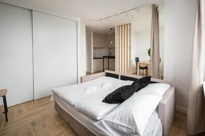 Łóżko lub łóżka w pokoju w obiekcie Chodecka Comfort Studio by BookingHost