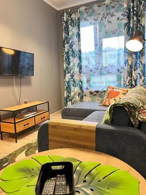 Telewizja i/lub zestaw kina domowego w obiekcie Apartment Metro Słodowiec Free Parking
