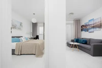 Łóżko lub łóżka w pokoju w obiekcie Burakowska 16 Apartament z Balkonem i Parkingiem Warszawska Wola by Noclegi Renters