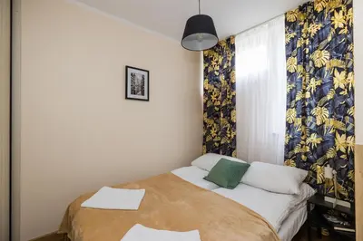 Łóżko lub łóżka w pokoju w obiekcie ShortStayPoland Chłodna B168
