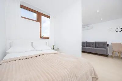Łóżko lub łóżka w pokoju w obiekcie Capitol Bright Apartment in Central Warsaw by Noclegi Renters
