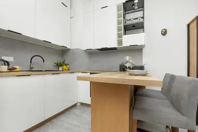 Kuchnia lub aneks kuchenny w obiekcie Klimatyczny Apartament na Wilanowie Parking & Balkon by Noclegi Renters