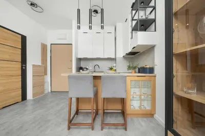 Kuchnia lub aneks kuchenny w obiekcie Klimatyczny Apartament na Wilanowie Parking & Balkon by Noclegi Renters