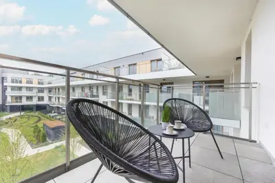 Balkon lub taras w obiekcie Klimatyczny Apartament na Wilanowie Parking & Balkon by Noclegi Renters