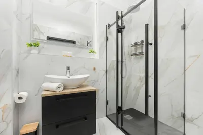 Łazienka w obiekcie Klimatyczny Apartament na Wilanowie Parking & Balkon by Noclegi Renters