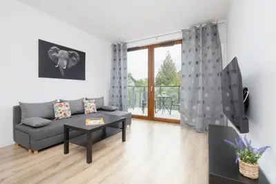 Część wypoczynkowa w obiekcie Nowoczesny Apartament WorkSpace Solipska z Parkingiem by Noclegi Renters