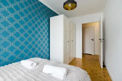 Łóżko lub łóżka w pokoju w obiekcie ShortStayPoland Grzybowska B167