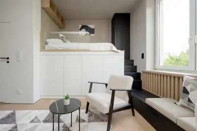 Część wypoczynkowa w obiekcie Przytulne Studio w Zielonej Okolicy Śródmieścia by Noclegi Renters