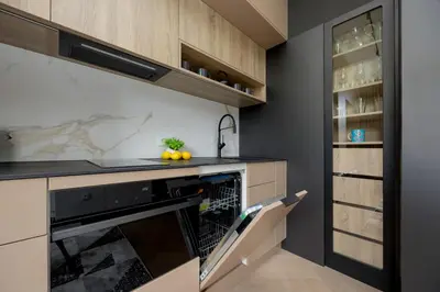 Kuchnia lub aneks kuchenny w obiekcie Przytulne Studio w Zielonej Okolicy Śródmieścia by Noclegi Renters