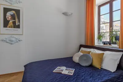 Łóżko lub łóżka w pokoju w obiekcie Old Town Home - Premium Apartment