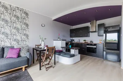 Kuchnia lub aneks kuchenny w obiekcie SuperApart Pożarowa 3B, parking
