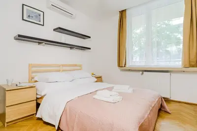 Łóżko lub łóżka w pokoju w obiekcie Apartament Leszczyńska