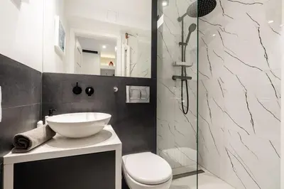 Łazienka w obiekcie Beetroot Apartment City Centre Rondo ONZ