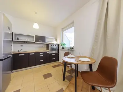Kuchnia lub aneks kuchenny w obiekcie Etno Chic Studio Ursynow