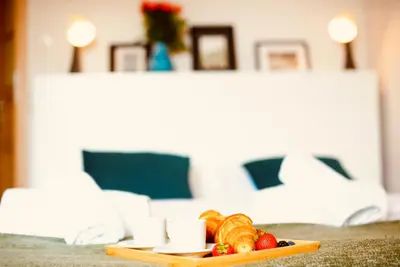 Łóżko lub łóżka w pokoju w obiekcie Stanislawa Augusta by P&J Apartments