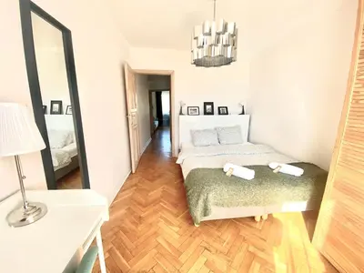 Łóżko lub łóżka w pokoju w obiekcie Stanislawa Augusta by P&J Apartments