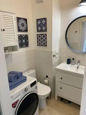 Łazienka w obiekcie Cozy City Appartement Warszawa