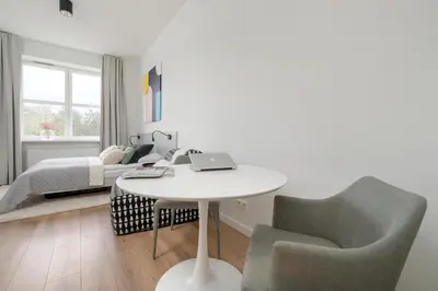 Łóżko lub łóżka w pokoju w obiekcie Gagarina Warszawa Przytulne Studio by Noclegi Renters