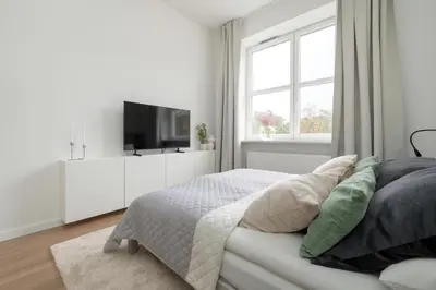 Łóżko lub łóżka w pokoju w obiekcie Gagarina Warszawa Przytulne Studio by Noclegi Renters