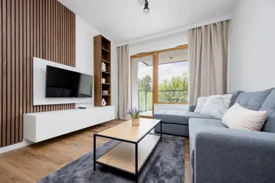 Telewizja i/lub zestaw kina domowego w obiekcie Apartamenty Ludwiki z Parkingiem by Noclegi Renters