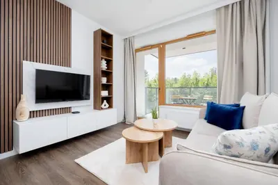 Telewizja i/lub zestaw kina domowego w obiekcie Apartamenty Ludwiki z Parkingiem by Noclegi Renters