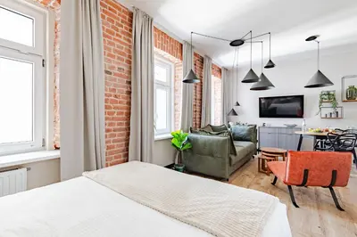 Telewizja i/lub zestaw kina domowego w obiekcie Mińska Apartament