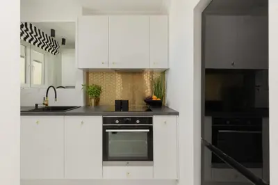 Kuchnia lub aneks kuchenny w obiekcie Senatorska Apartment Warsaw by Noclegi Renters
