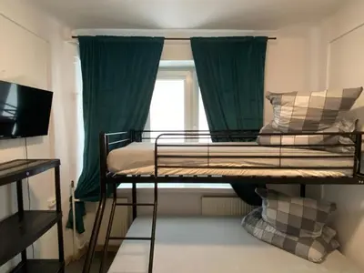 Łóżko lub łóżka w pokoju w obiekcie Hostel Harmonia