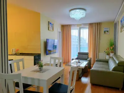 Telewizja i/lub zestaw kina domowego w obiekcie APARTAMENT PANORAMA w360