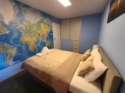 Łóżko lub łóżka w pokoju w obiekcie APARTAMENT PANORAMA w360