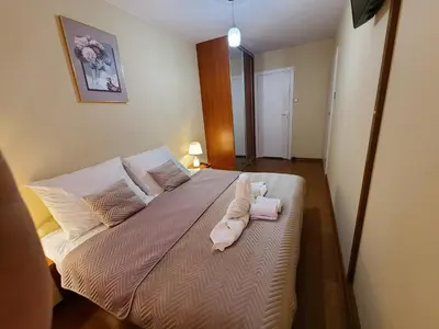 Łóżko lub łóżka w pokoju w obiekcie APARTAMENT PANORAMA w360