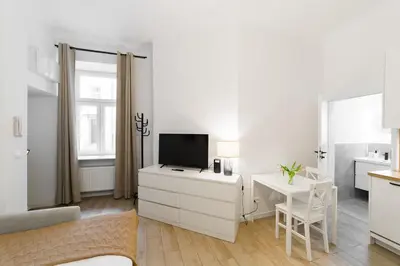 Telewizja i/lub zestaw kina domowego w obiekcie Nowoczesne studio w Сentrum