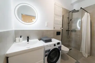 Łazienka w obiekcie Nowoczesne studio w Сentrum