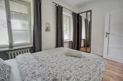 Łóżko lub łóżka w pokoju w obiekcie Warsaw Premium Apartments Boczna
