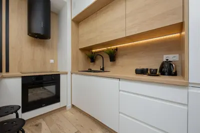 Kuchnia lub aneks kuchenny w obiekcie Herbu Oksza Elegant Apartment with Parking by Noclegi Renters