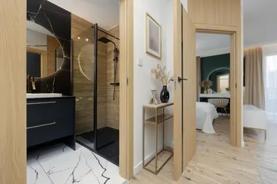 Łazienka w obiekcie Herbu Oksza Elegant Apartment with Parking by Noclegi Renters