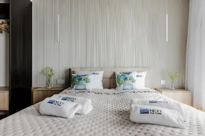 Łóżko lub łóżka w pokoju w obiekcie Apartment Emilii Plater