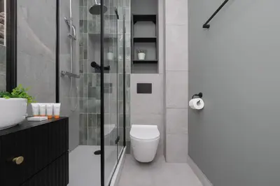 Łazienka w obiekcie Elegancki Apartament dla 4 osób w Warszawie by Noclegi Renters