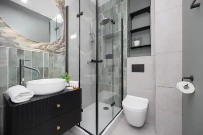 Łazienka w obiekcie Elegancki Apartament dla 4 osób w Warszawie by Noclegi Renters